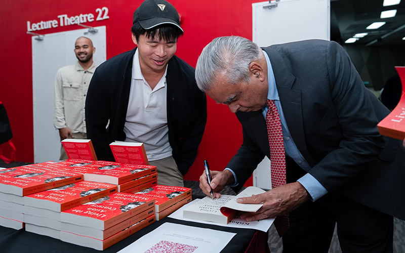 Kishore Mahbubani with his new book
